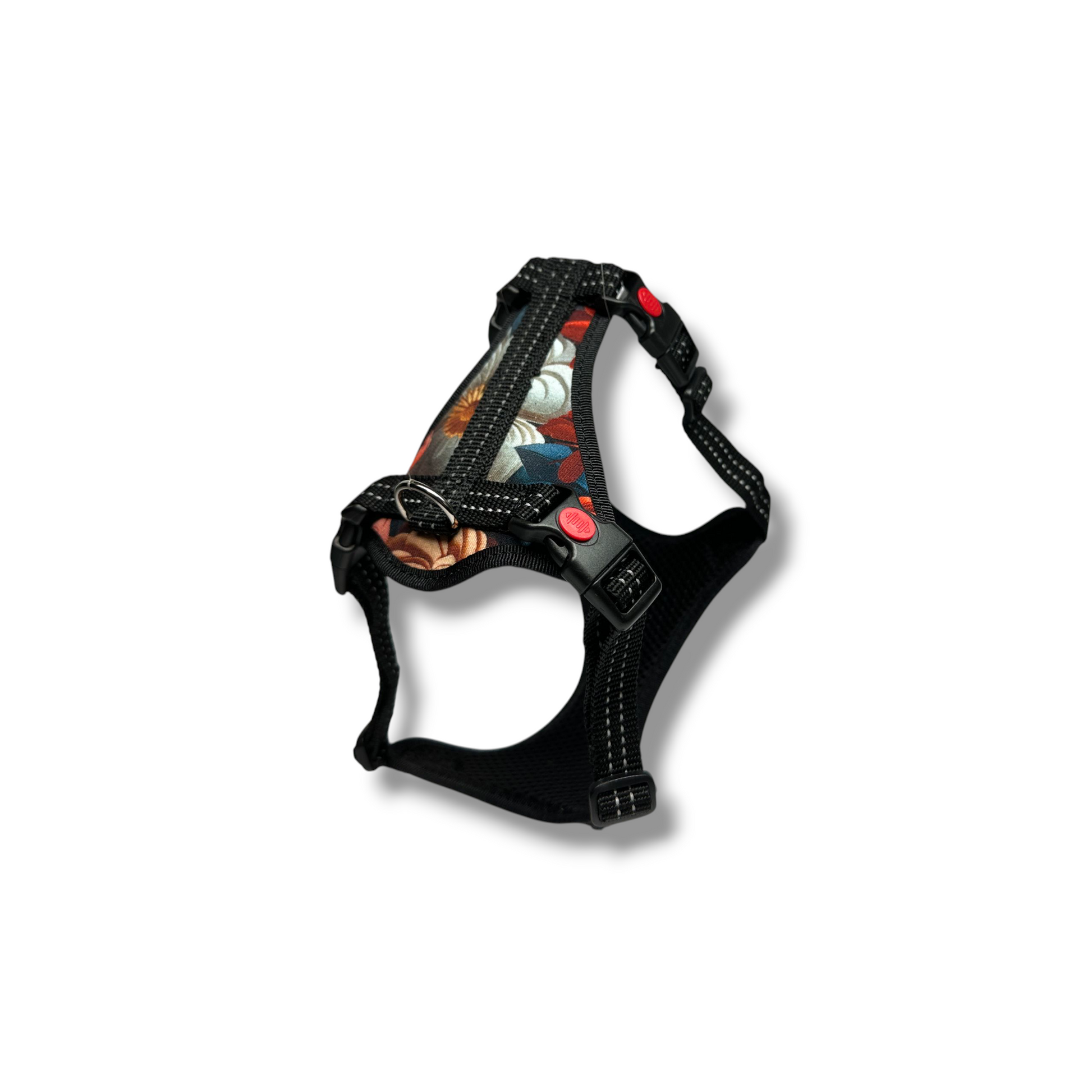 Black dog harness with colorful interior on a white background