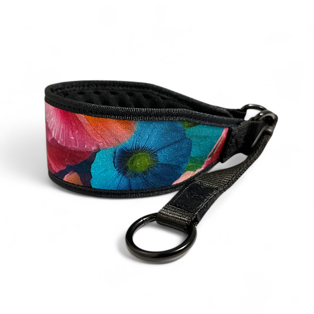 Colorful floral-patterned dog necklace on a white background