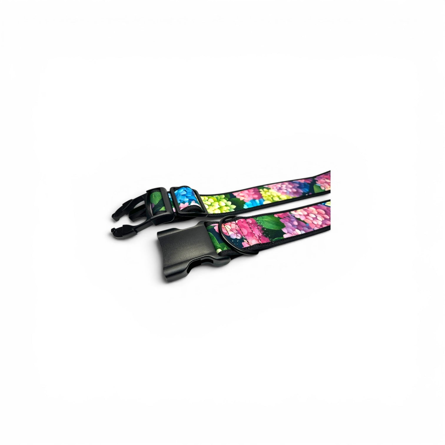 Two size options of the Hydrangea wide dog collar laid open with black quick-release buckles.