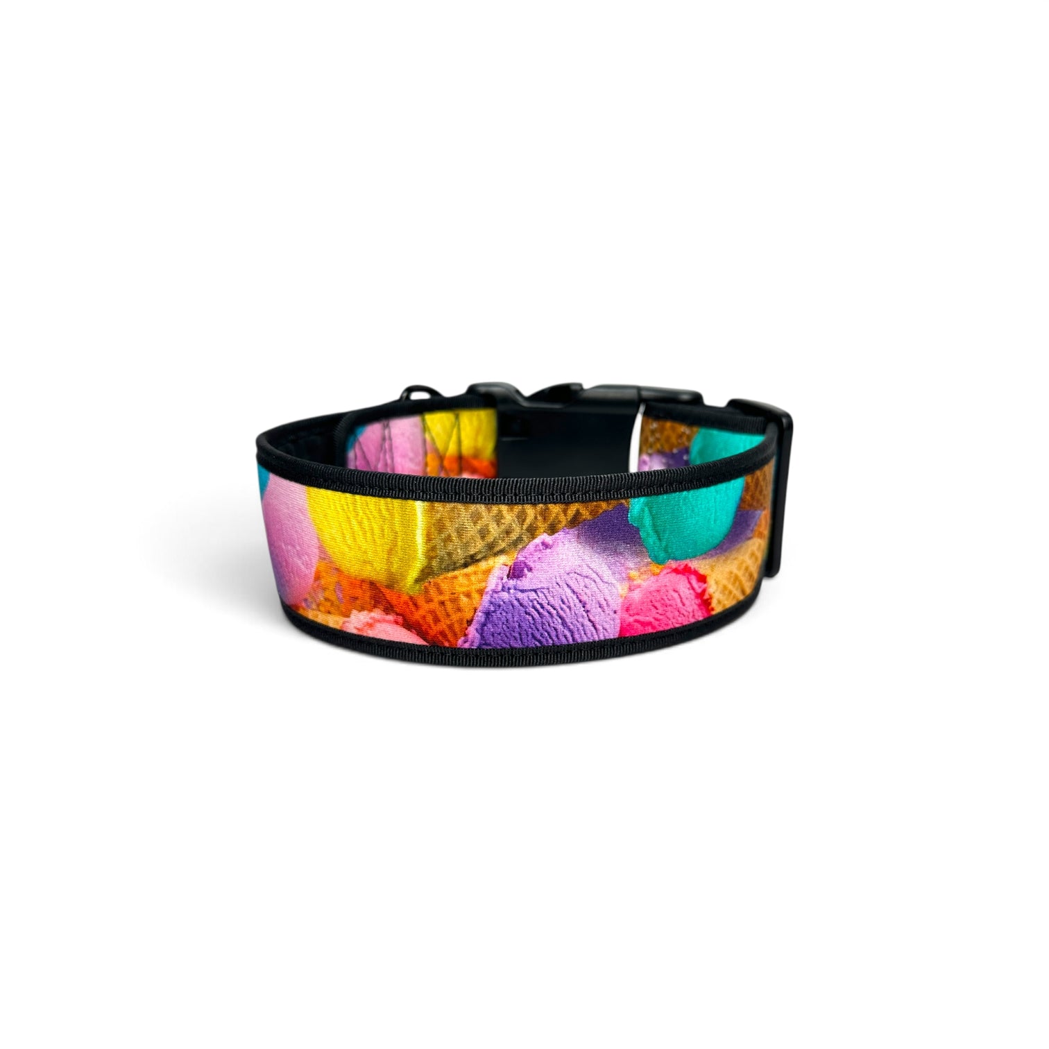 A black adjustable dog collar featuring a vibrant, colorful ice cream scoop pattern, shown on a plain white background.
