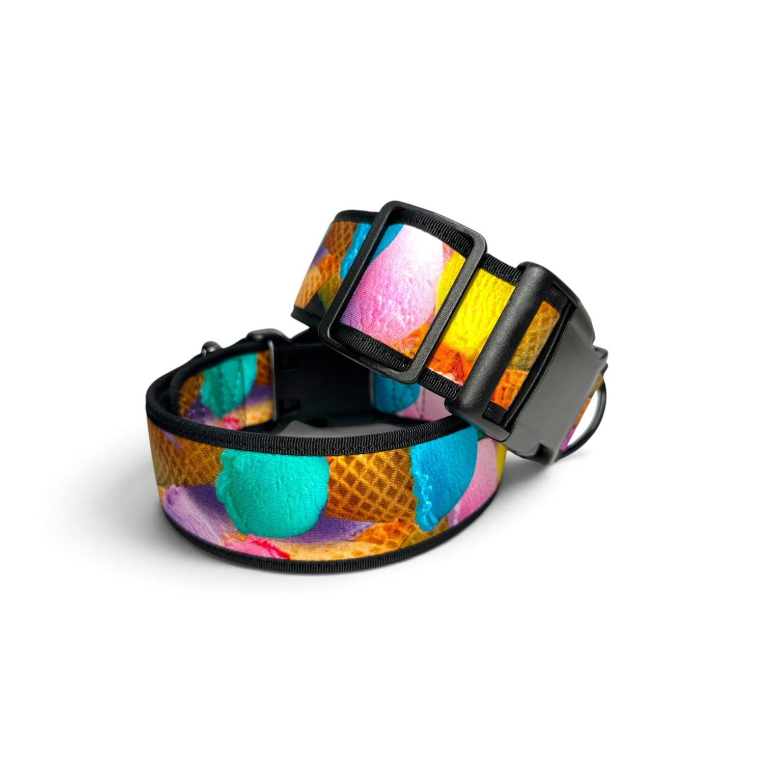 A dog collar with a colorful ice cream scoop pattern on a waffle cone background, featuring a black plastic buckle.